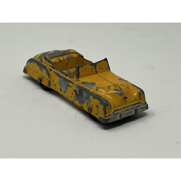 1949 OLDSMOBILE CONVERTIBLE YELLOW TOOTSIETOY CAR - Picture 1 of 4